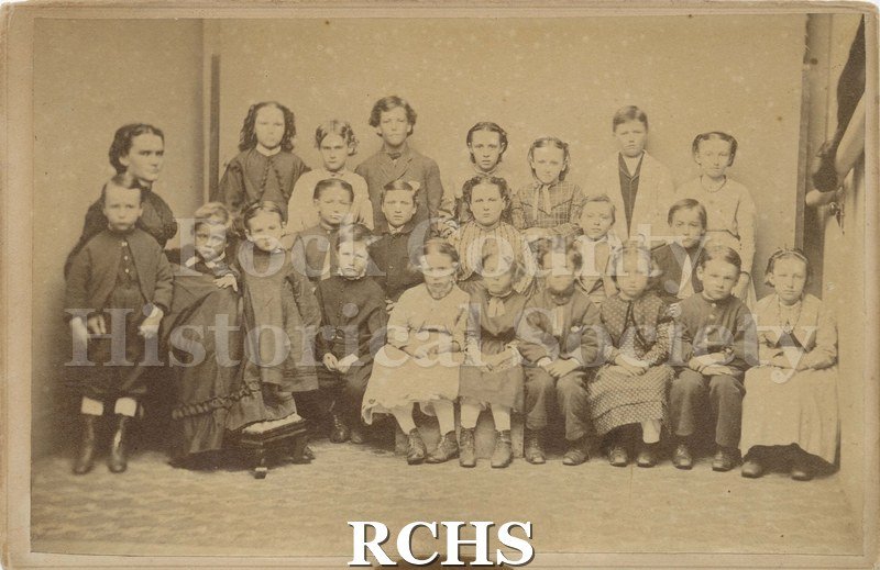 Black and white photograph of Magnolia School pupils of October 1868. Children's ages seem to range from five or six to fourteen or fifteen.