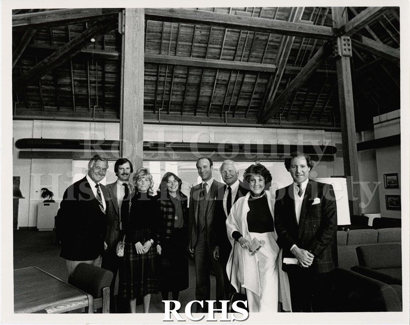 Black and white photograph of Pearson's Hall rededication 02/02/1985. Group photograph of men and women standing upstairs in Pearsons, at Beloit College.