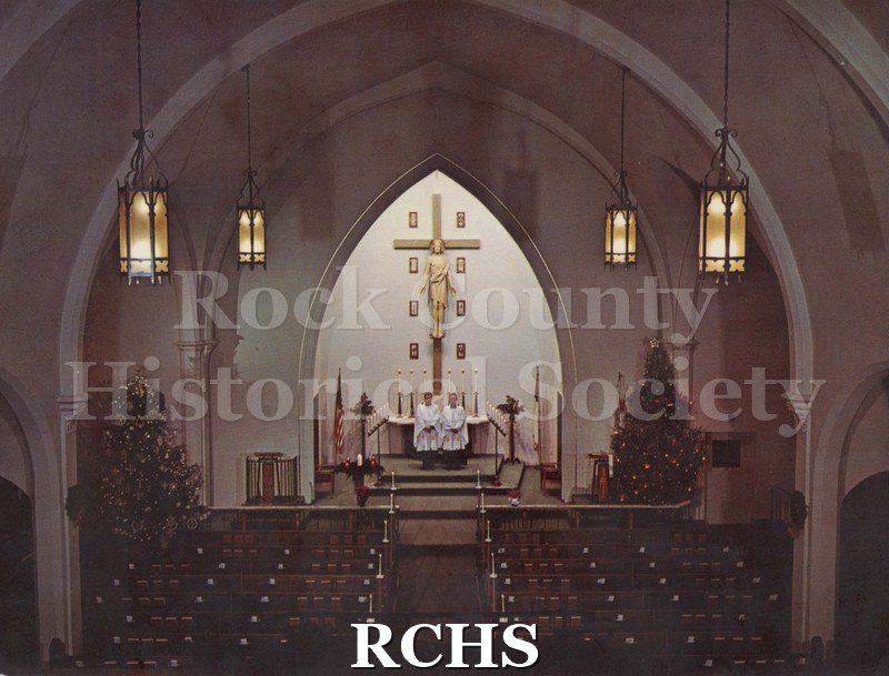Colored photograph of Our Saviors Lutheran Church, Beloit, WI. The inside of the church is printed on a Christmas card.