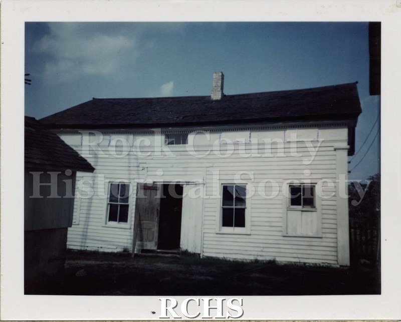 Black and white photograph of an outbuilding on Paul Campion Farm, Milton, Wis. Highway 26 & Bingham Rd.