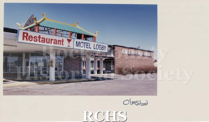 Color photo of Wong's Garden Restaurant in American Inn, 2632 Milton Avenue, Janesville. Torn down 1991. Front shows signs: Restaurant; Motel Lobby; American Inn.