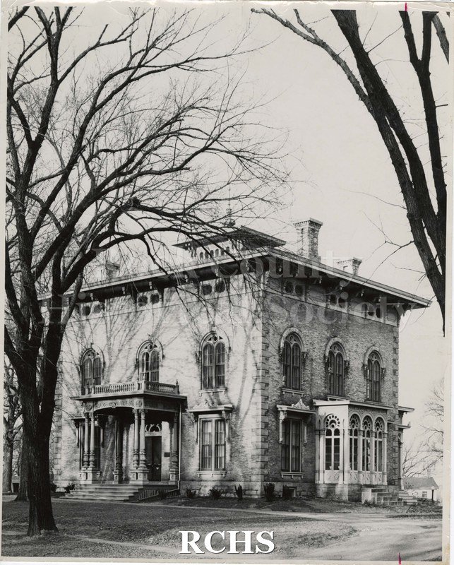 Black and white photograph of the Tallman House from right side. Shows leafless trees.