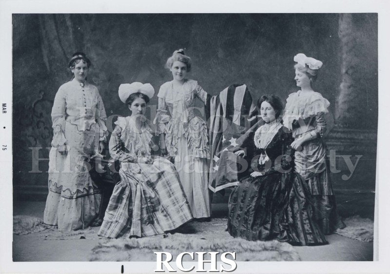 Black and white photograph of the Janesville High School 1908 Graduation Class Skit with five women in period costumes.