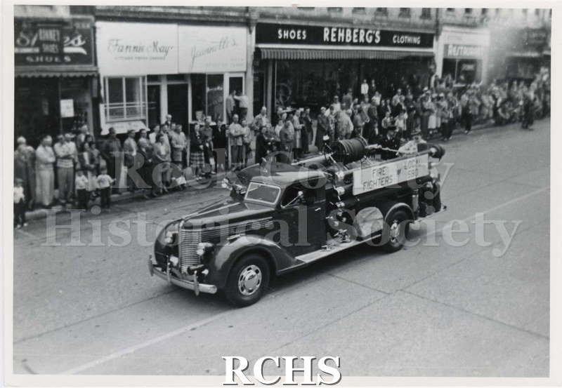 Black and white photograph of the Fire Department truck in Labor Day Parade 1952.