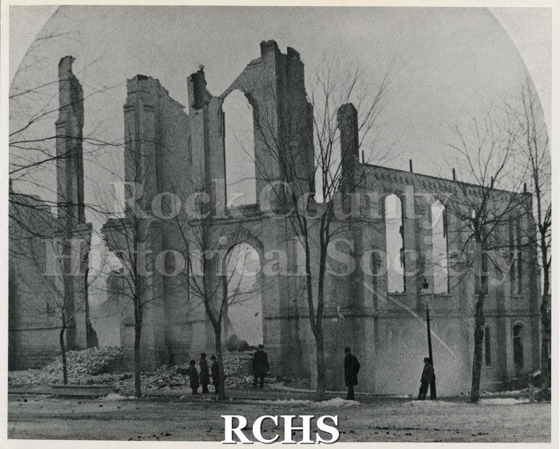 Black and white photograph of the burned-out First Baptist Church (cor. Jackson and W. Court) 1884.
