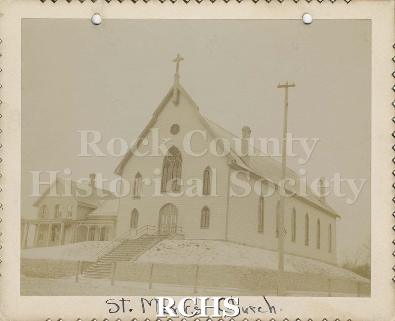 Black and white photograph of St. Mary's Church, Janesville, WI. On bottom: "St. Mary's Church".