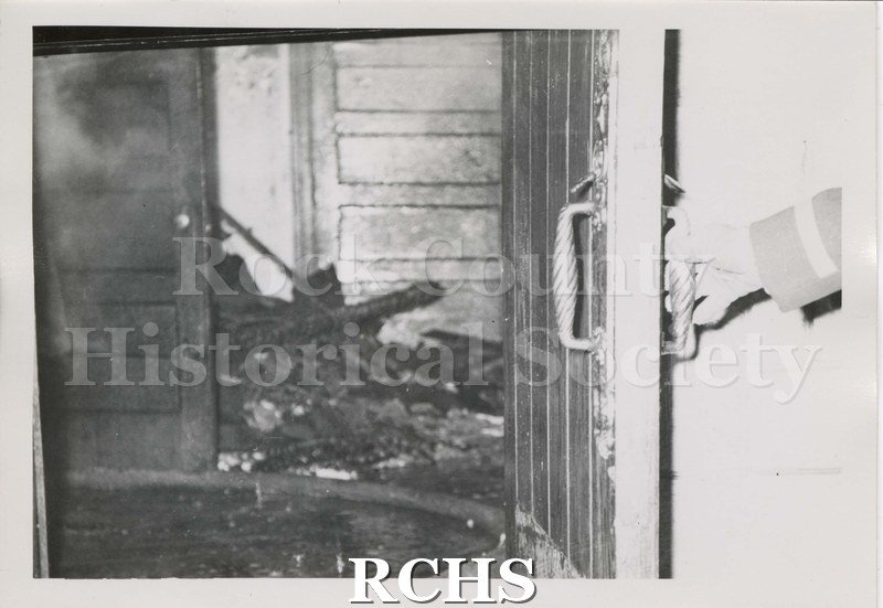 Black and white photograph of the fire at Beloit College Eaton Chapel showing interior fire damage.