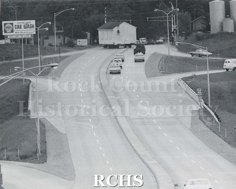 Black and white photograph of the moving of the Frances Willard Schoolhouse on July 19, 1972 on Memorial Avenue.