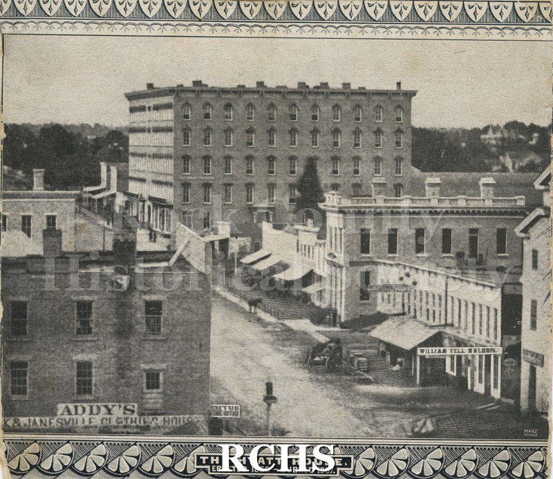 Black and white photograph of Downtown Janesville from upper floors of a building.
