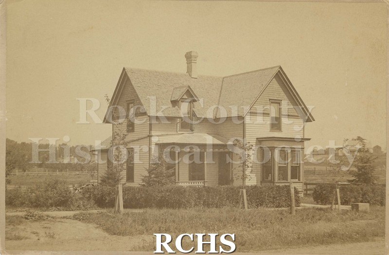Black and white photograph of first home in Edgerton from 1890-1895.