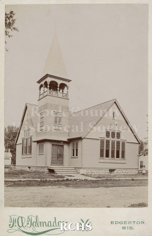Black and white photograph of Lewis Keller's first church 1879-1884, Edgerton. Shows the front of a church.