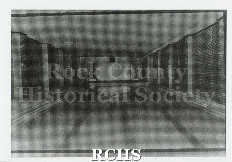 Black and white photograph of swimming pool Janesville High School 1924. Written on reverse: "Boys' Swimming Pool 1924 Phoenix pg.19".