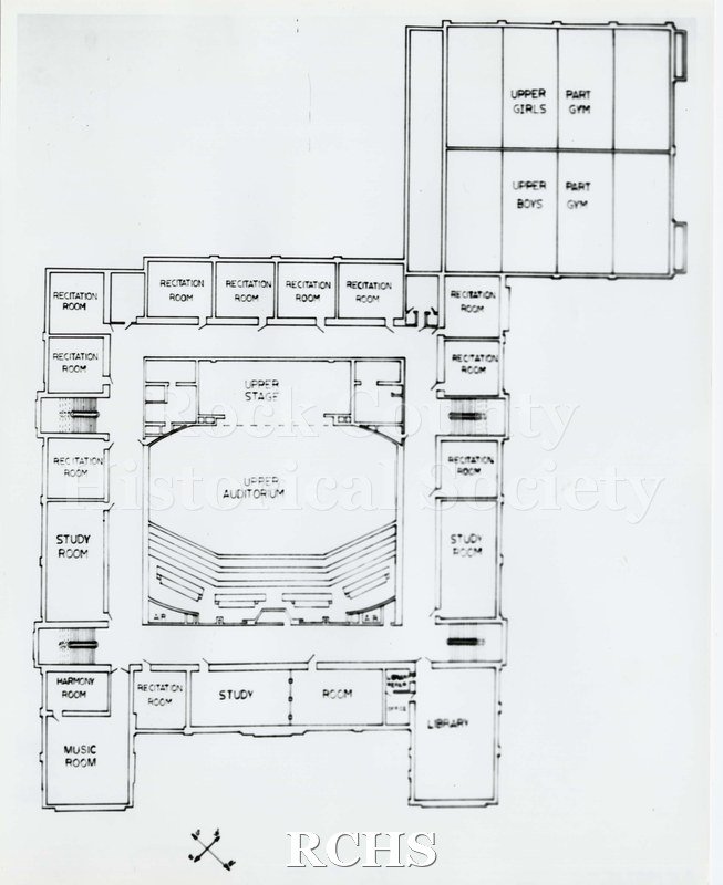 Black and white photograph of the drawing of Janesville High School auditorium including the second story surrounding the auditorium which includes music, recital.