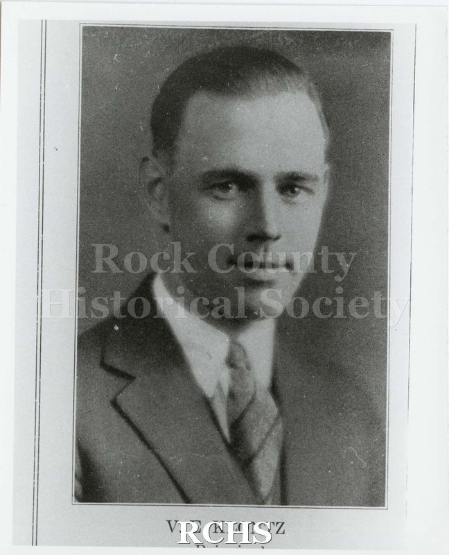 Black and white photograph of V.E. Klontz, as stated at bottom of photo. Written on reverse: "Veron E. Klontz Principal 1928 Phoenix pg. 17".