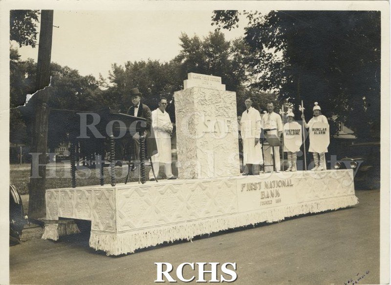 Black and white photograph of Janesville Centennial Float 1935 for First National Bank (so stated on side of float), founded 1833.
