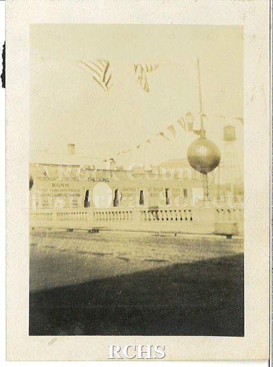 Black and white photograph of Milwaukee Street bridge during Harvest Festival Sept. 22, 1922 .