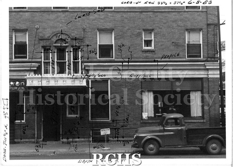 Black and white photograph of Hotel Hilton, Beloit, WI. Shows the facade of the same brick building as in LD36.1990.29.