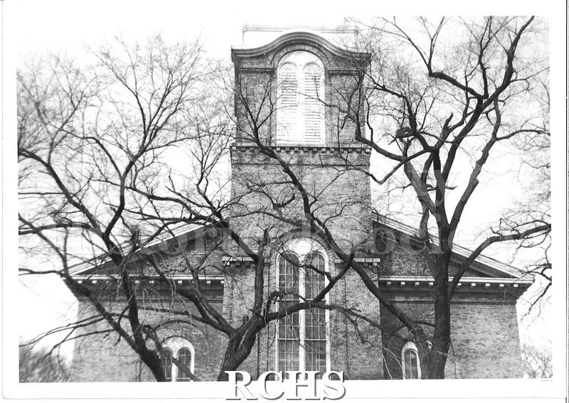 Black and white photograph of the bottom of the bell tower from the original building for the First Congregational Church in Beloit.