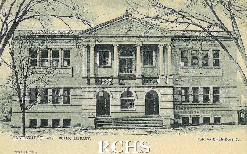 Postcard. Black and white image of the exterior of the Janesville Public Library.