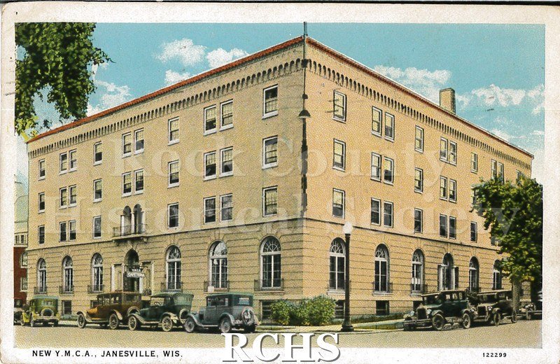 Postcard. Colorized image of the exterior of the YMCA Building in Janesville. Postcard is addressed to Mr. J.R. Worcester in Oberlin, Ohio. Postmarked Sept.