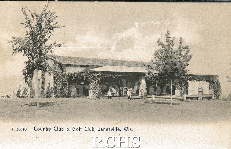 Postcard. Black and white photograph of the club house at the Janesville Country Club. Postcard is addressed to Miss Irma Zickler. Postmarked July 27, 1909.