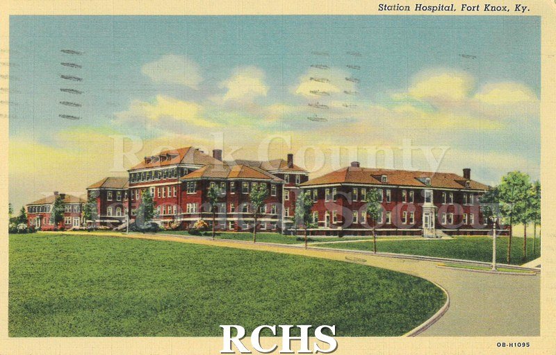 Postcard. Color image of the Station Hospital at Fort Knox, Kentucky. Postcard is addressed to Mrs. Milton Swenson of Janesville. Postmarked 6 December 1940.