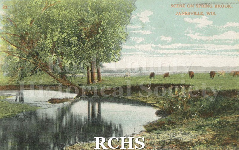 Postcard. Tinted image of a scene on Spring Brook in Janesville. Postcard is addressed to Felix Gussert in Milwaukee. Postmarked Feb. 13, 1909.