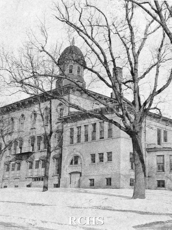 Black and white photograph of the exterior of a school. Tentatively identified as Jefferson School in the Court House Hill neighborhood on the back of the photo.