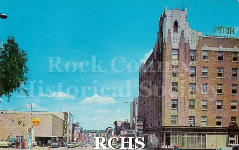Postcard. color photo of Milwaukee Street in Janesville.
