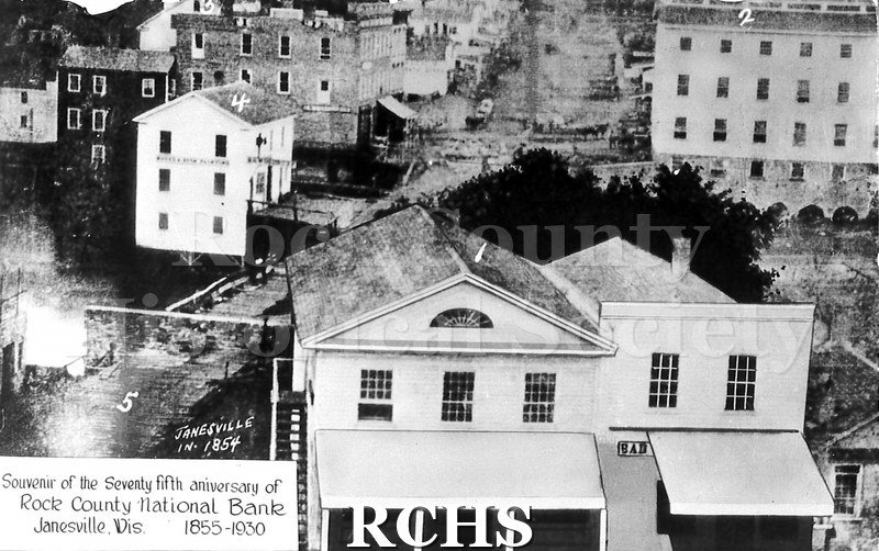 Postcard. Black and white photograph of Janesville in 1854. Postcard was issued in 1930 to celebrate the 75th anniversary of the Rock County National Bank.