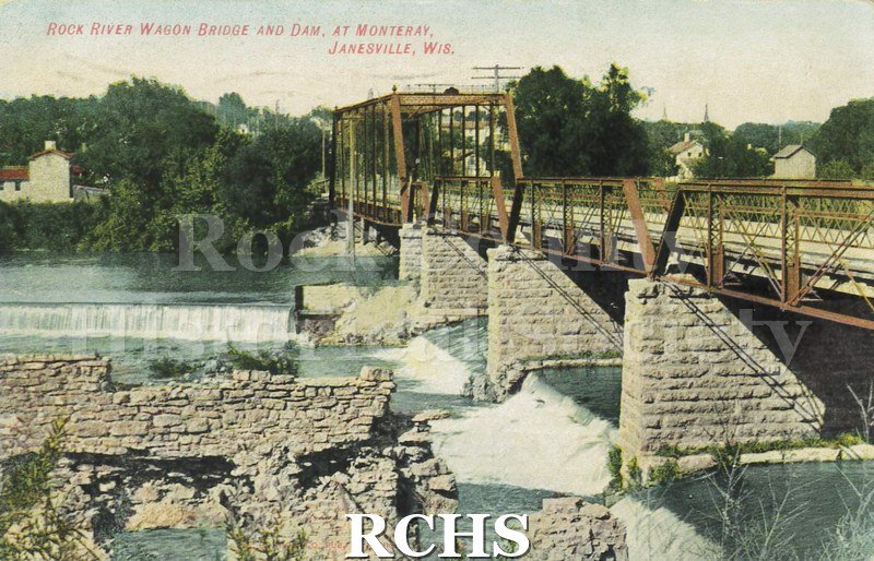Postcard. Tinted image of the wagon bridge and dam over the Rock River at Monterey. Postmarked 27 April 1910 and addressed to Mrs. Martin Turseth of Evansville.