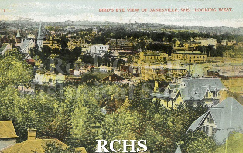 Postcard. Tinted image of an aerial view of Janesville. Addressed to Eda Finger of Fort Atkinson. Postmarked 2 August 1908.