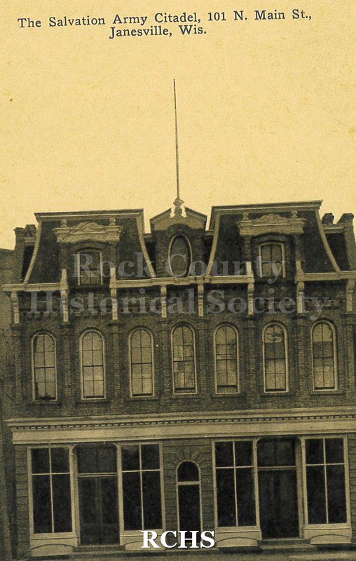 Postcard. Black and white photograph of the exterior of the Salvation Army Citadel at 101 N. Main Street in Janesville.