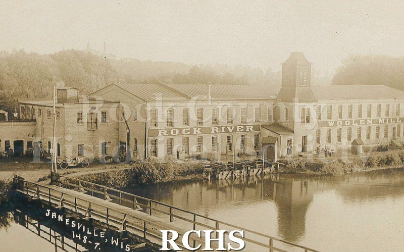 Postcard. Sepia-toned photograph of the exterior of Rock River Woolen Mills.