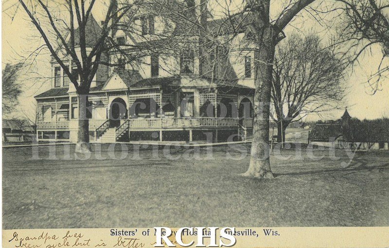 Postcard. Black and white photograph of the Sisters of Mercy Hospital in Janesville. Addressed to Margaret McCulloch of Madison. Postmarked 30 July 1908.