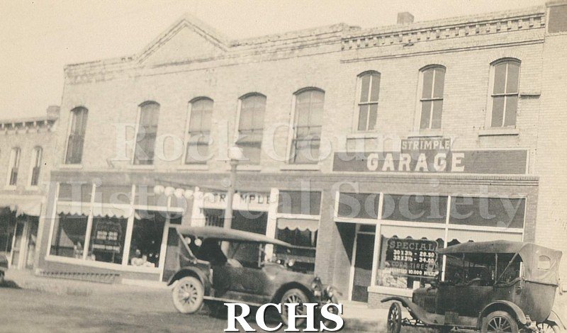 Black and white photograph of the exterior of Strimple Garage in Janesville.