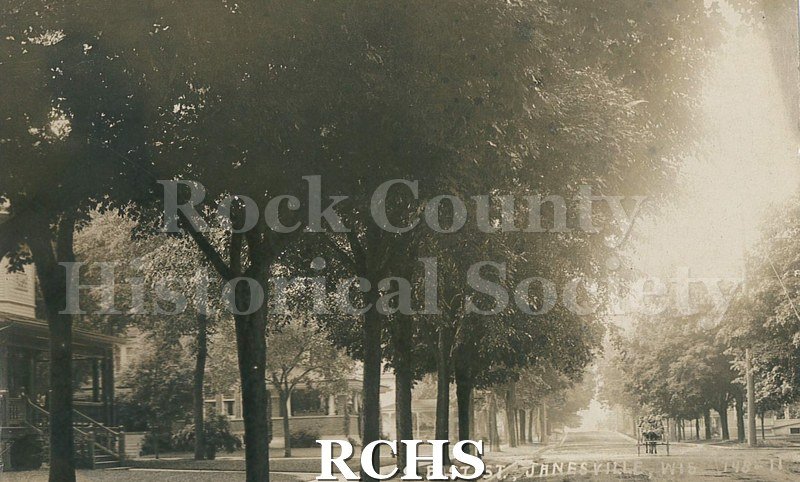Postcard. Black and white photograph of S. East Street (present-day Atwood Avenue) in Janesville.