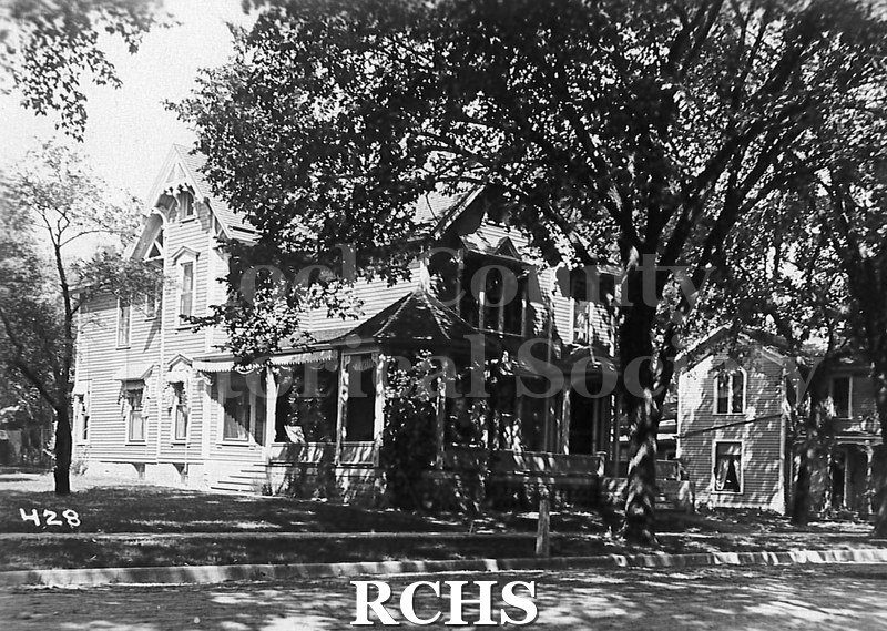 Postcard. Black and white photograph of an unidentifed home in Janesville.