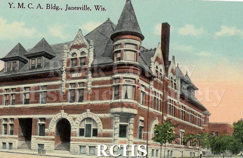 Colored postcard of the YMCA in Janesville. Addressed to Mr. Ed Lellmer(?) of 1332-10 Avenue Antigo, Wisconsin. Written: "Thank you Ed for the cute card.