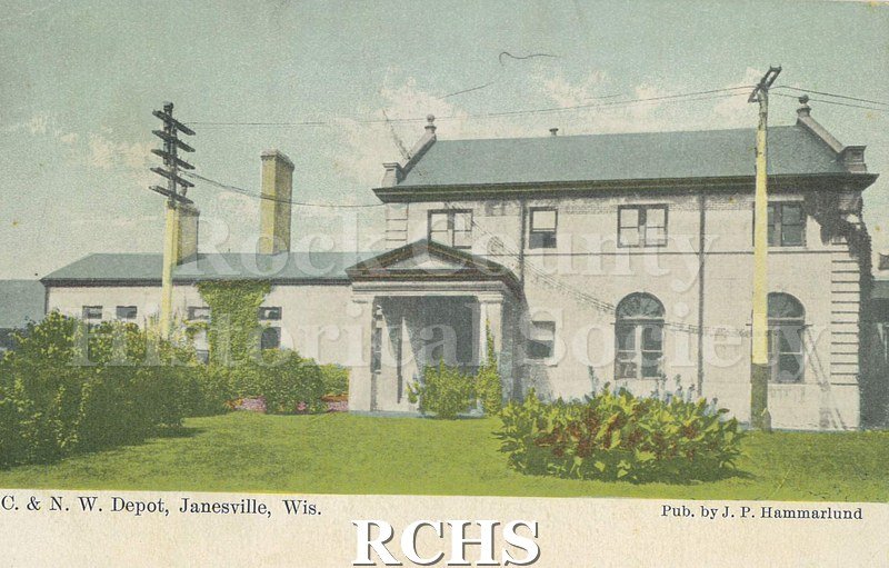 Postcard. Tinted image of the Chicago & Northwestern depot in Janesville. Addressed to W.E. Bingham of Hebron, Illinois. Postmarked 6 September 1910.