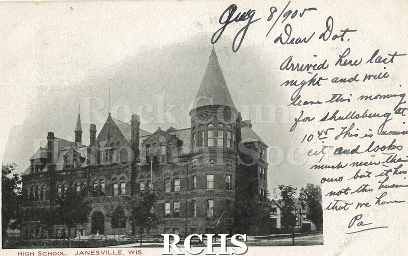 Postcard. Black and white photograph of Janesville High School. Addressed to Olene F. Suchateau of Green Bay. Postmarked 8 August 1905.