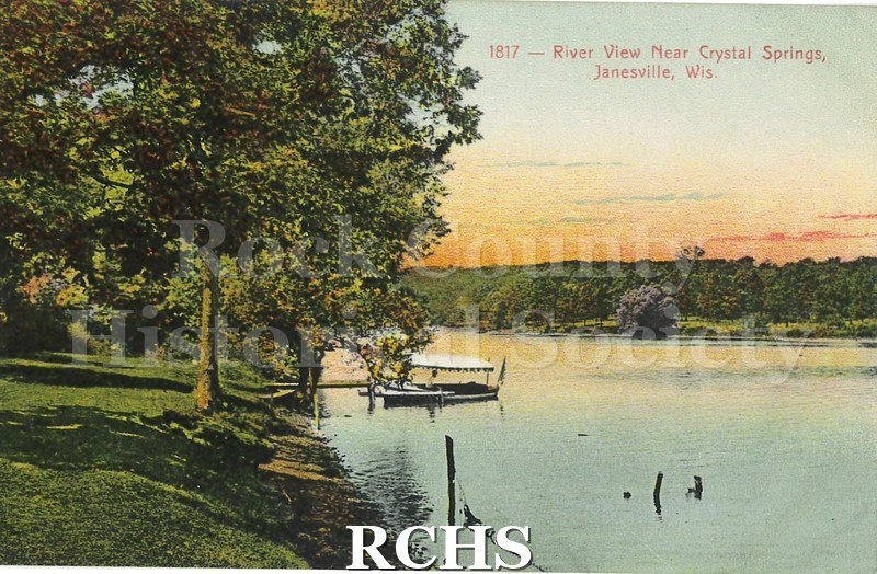 Postcard. Tinted image of a pleasure boat docking on the Rock River near Crystal Springs in Janesville.