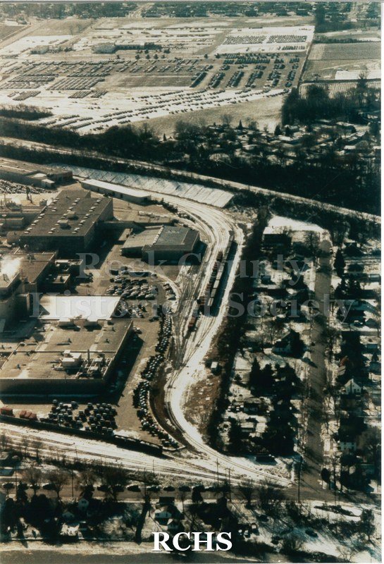 Aerial color photo of the GM grounds, facing south towards JATCO. Photo shows W Delevan Dr.