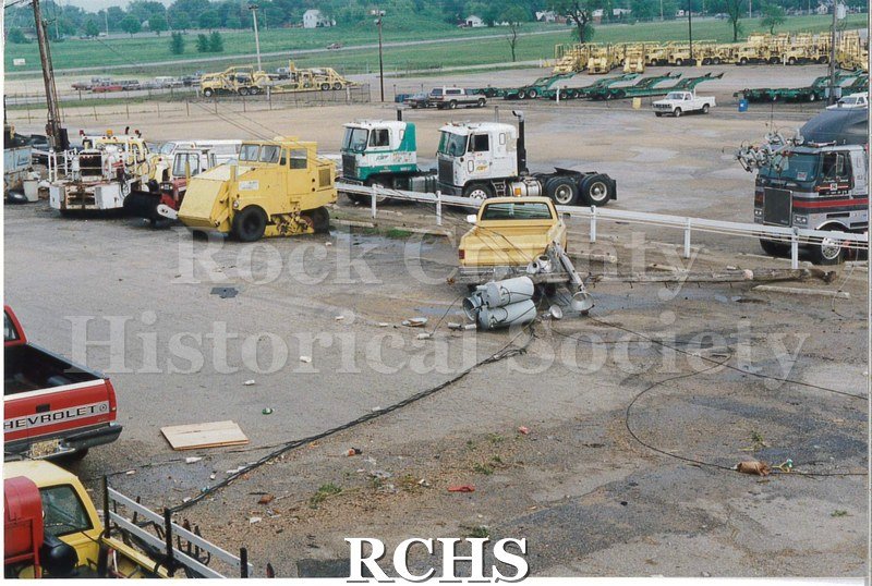 Color photo of the damage to the Janesville Terminal from the 1991 tornado. Another view of the location from .40 and .41, though facing the other way.