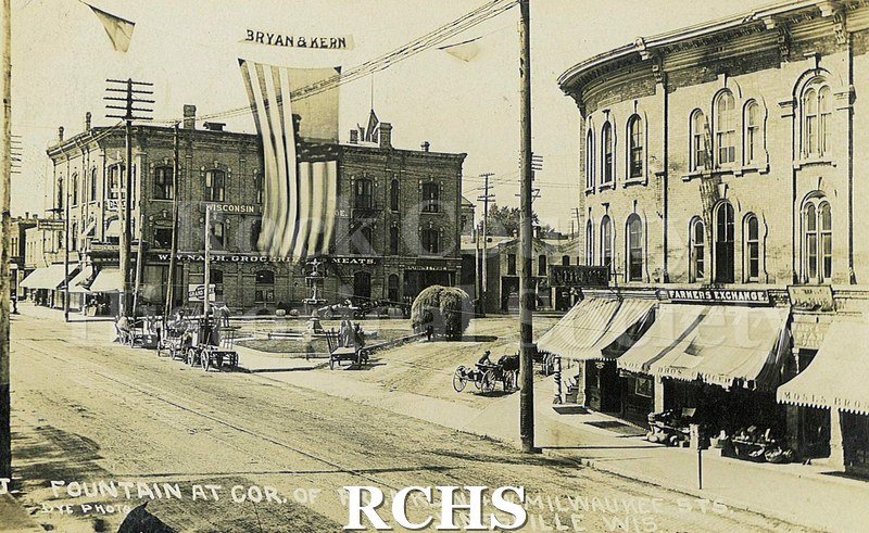 Postcard. Black and white photograph of the fountain at the corner of Franklin & W. Milwaukee Streets in Janesville. Addressed to W.S. Fifield in Reno, Nevada.