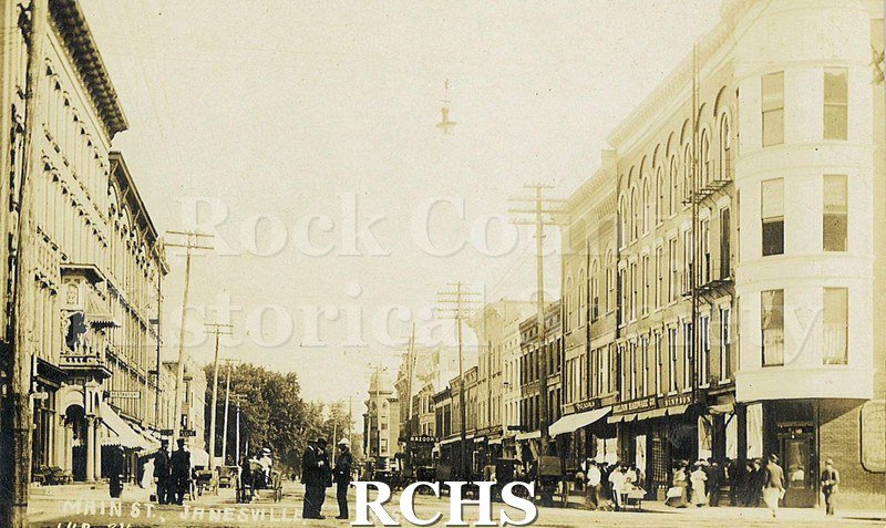 Postcard. Black and white photograph of Main Street in Janesville.