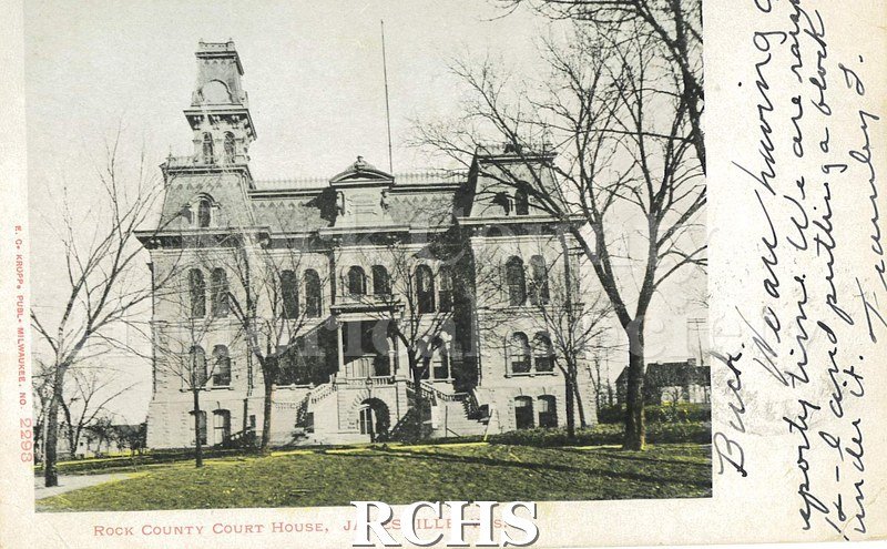 Postcard. Tinted image of the Rock County Court House in Janesville. Addressed to Eugene Joslin of Whitewater. Postmarked 25 July 1906.