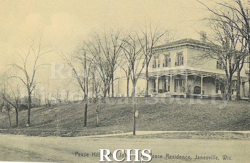 Postcard. Black and white drawing of the John J.R. Pease home in Janesville. Note written.