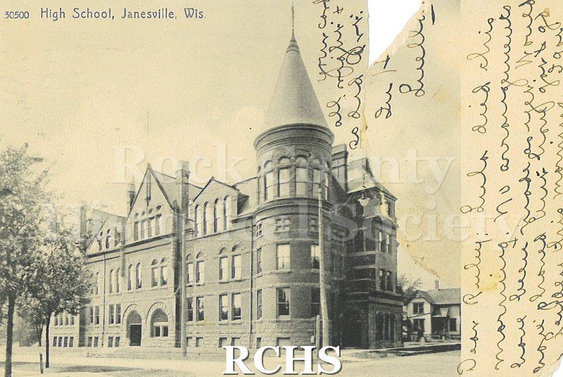 Postcard. Black and white image of the exterior of Janesville High School. Addressed to Ruby L. Bennett of Milton. Postmarked 25 June 1907.