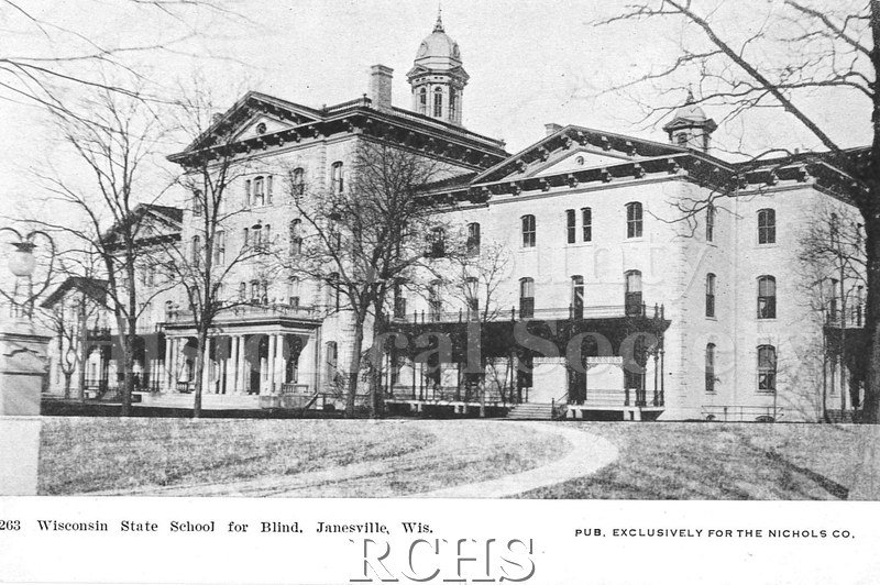 Postcard. Black and white photograph of the exterior of the Wisconsin State School for the Blind. Addressed to Mrs. M.E. Elwood of Denver, Colorado. No postmark.